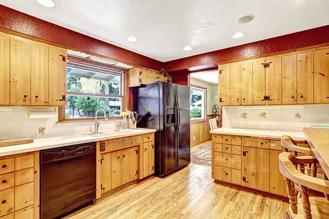 natural finish traditional kitchen with slab cabinet doors