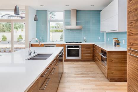 two tone kitchen with light blue tile backsplash