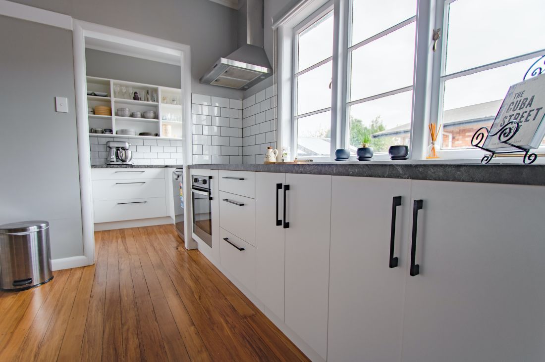 white cabinets with black hardware